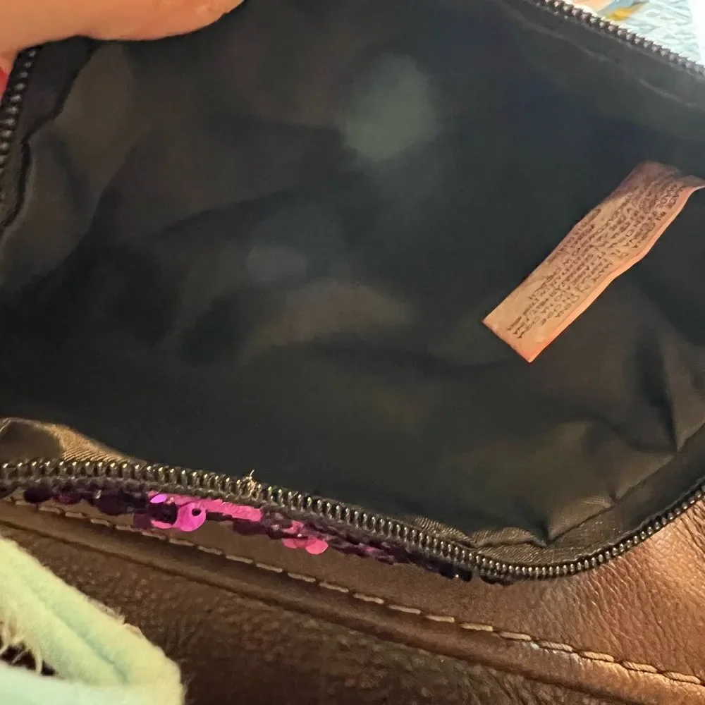 Claire’s color change sequin clutch or cosmetics bag